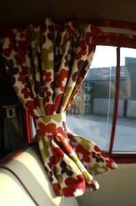 VW Campervan Curtains in Clarke and Clarke Anja Summer fabric in a splitscreen van